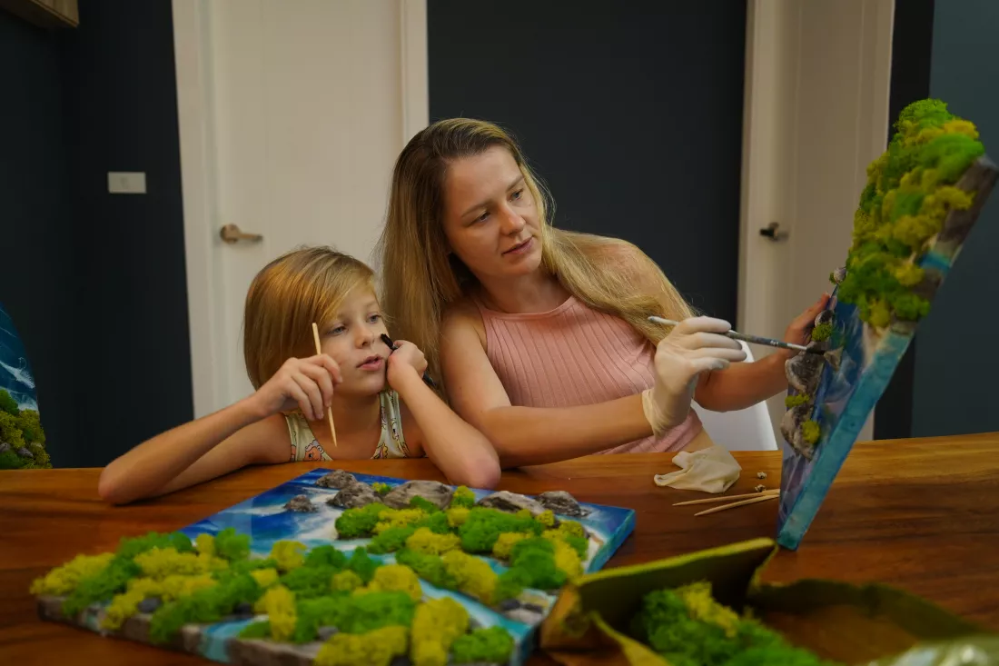 mother-her-daughter-craft-vibrant-natural-landscapes